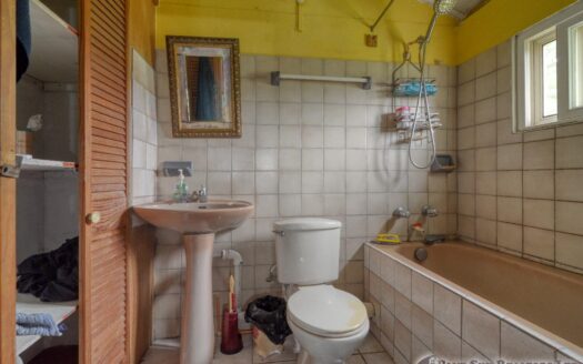 CORONA – 2 Floor, 6 Bedroom, 5 bath house in serene, central location on 1.10 Acre of lush property