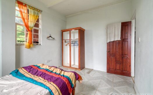 CORONA – 2 Floor, 6 Bedroom, 5 bath house in serene, central location on 1.10 Acre of lush property