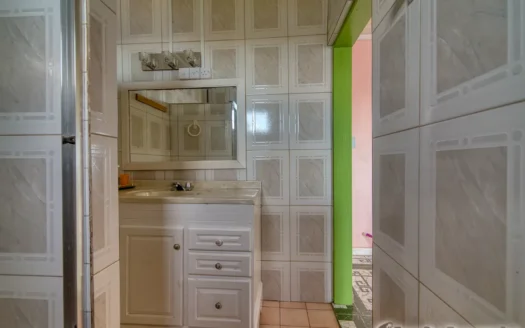 THIBOUD – Adorable 2 Floor 3 Bedroom Hillside Property on 9,263.sq.ft. Offering Panoramic Ocean Views