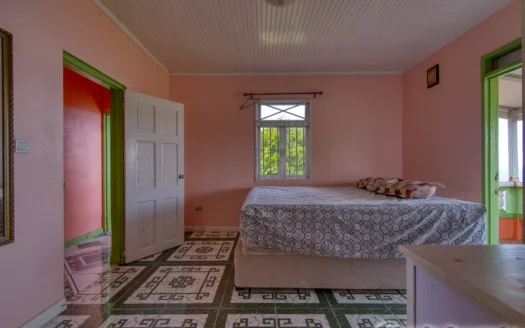 THIBOUD – Adorable 2 Floor 3 Bedroom Hillside Property on 9,263.sq.ft. Offering Panoramic Ocean Views