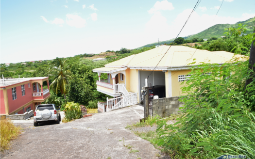 GRAND SAVANNE –TWO STOREY HOME ON 7,009 SQUARE FEET OF LAND WITH SEA AND MOUNTAIN VIEWS