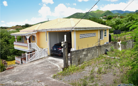GRAND SAVANNE –TWO STOREY HOME ON 7,009 SQUARE FEET OF LAND WITH SEA AND MOUNTAIN VIEWS