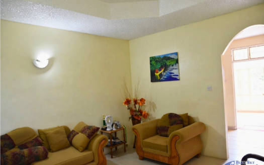 GRAND SAVANNE –TWO STOREY HOME ON 7,009 SQUARE FEET OF LAND WITH SEA AND MOUNTAIN VIEWS