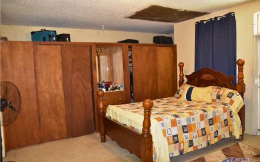 GRAND SAVANNE –TWO STOREY HOME ON 7,009 SQUARE FEET OF LAND WITH SEA AND MOUNTAIN VIEWS
