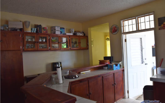 GRAND SAVANNE –TWO STOREY HOME ON 7,009 SQUARE FEET OF LAND WITH SEA AND MOUNTAIN VIEWS